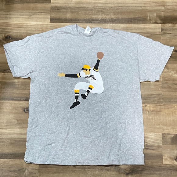 Other - $1 - Gray Graphic T-Shirt with Pirates Basketball Player Design